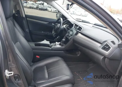 2017 Honda Civic Touring z USA, uszkodzony, nr VIN 2HGFC1F97HH654564